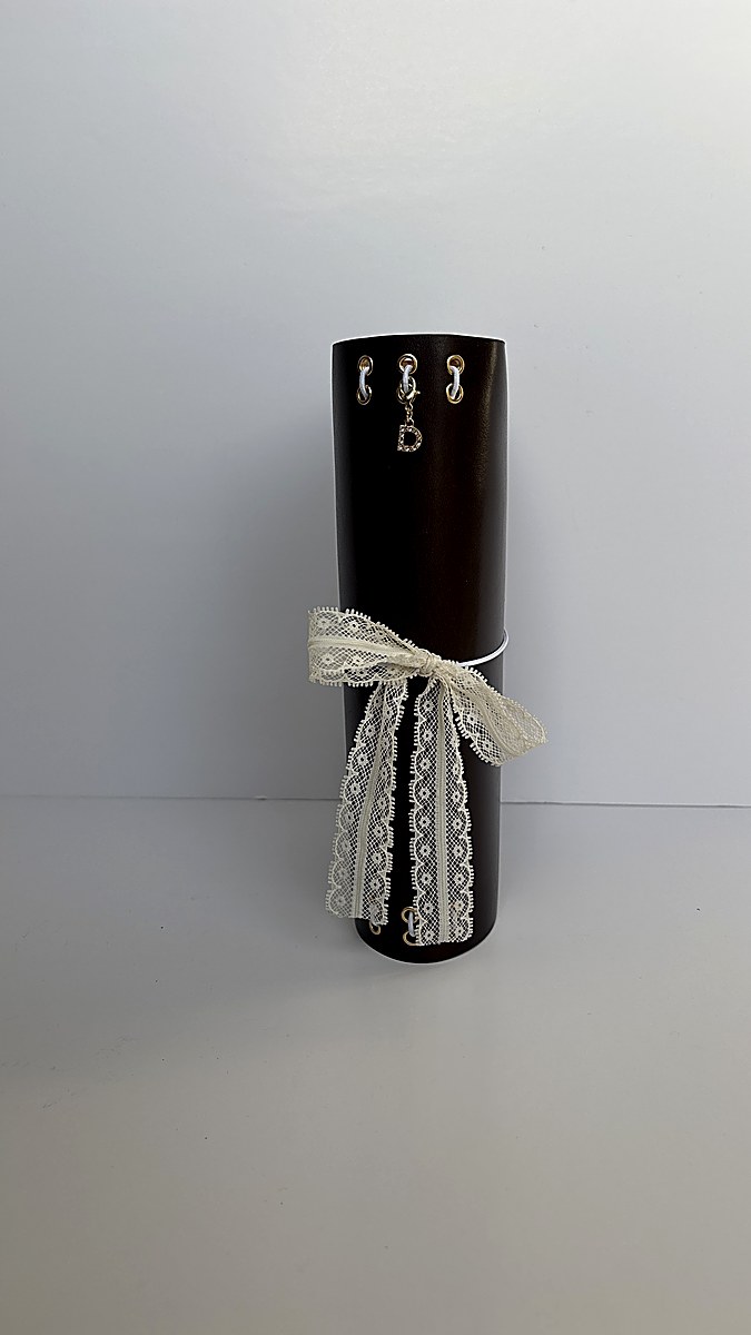 Three journals on retail shelf with charms