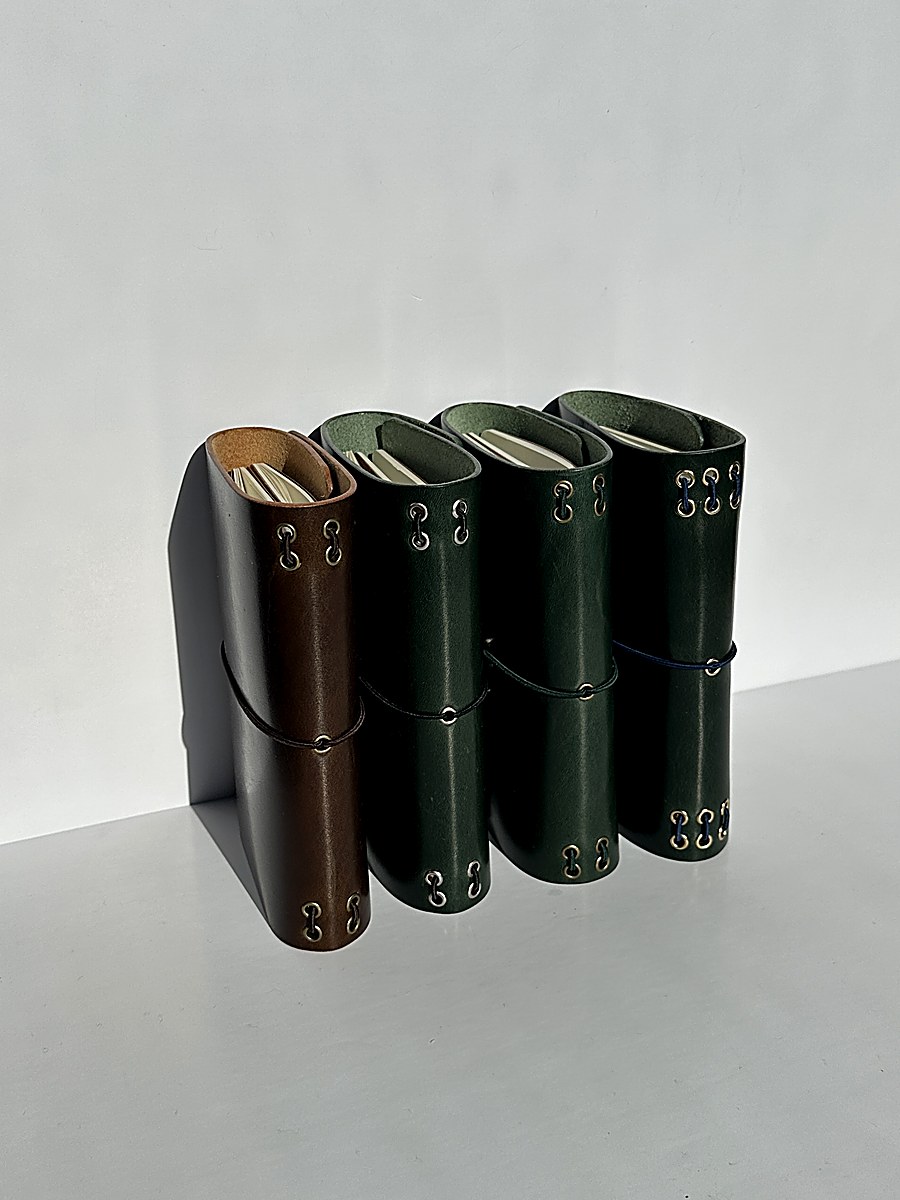 Cognac, chocolate, and forest green trio with pink string